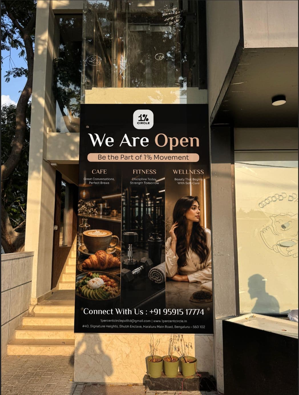 1% Circle storefront banner — We Are Open